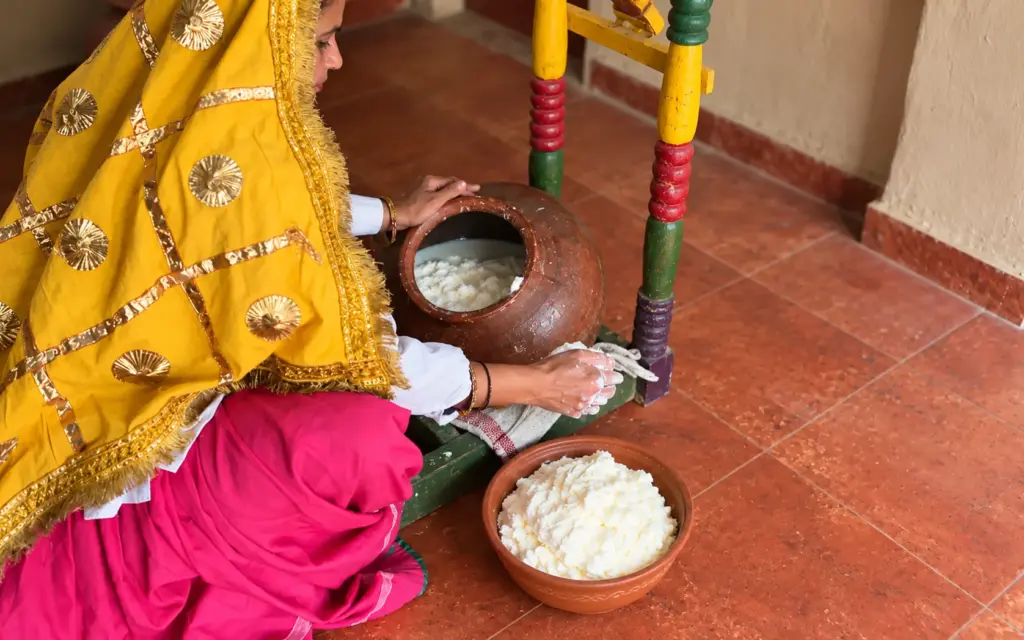 Fresh white makkhan gathered by hand from the churn